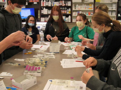 Picture of eight students sitting at a table doing some hands on at Scrubs Camp.
Scrubs Camps are one-day learning experiences conducted at 16 locations throughout the state. Fall River Health Services is excited to be 1 out of the 16 selected this year. Campers will hear from healthcare professionals who will discuss what they do and how they got into their chosen career field. They will also be able to participate in exciting hands-on activities and receive personalized career guidance plans.